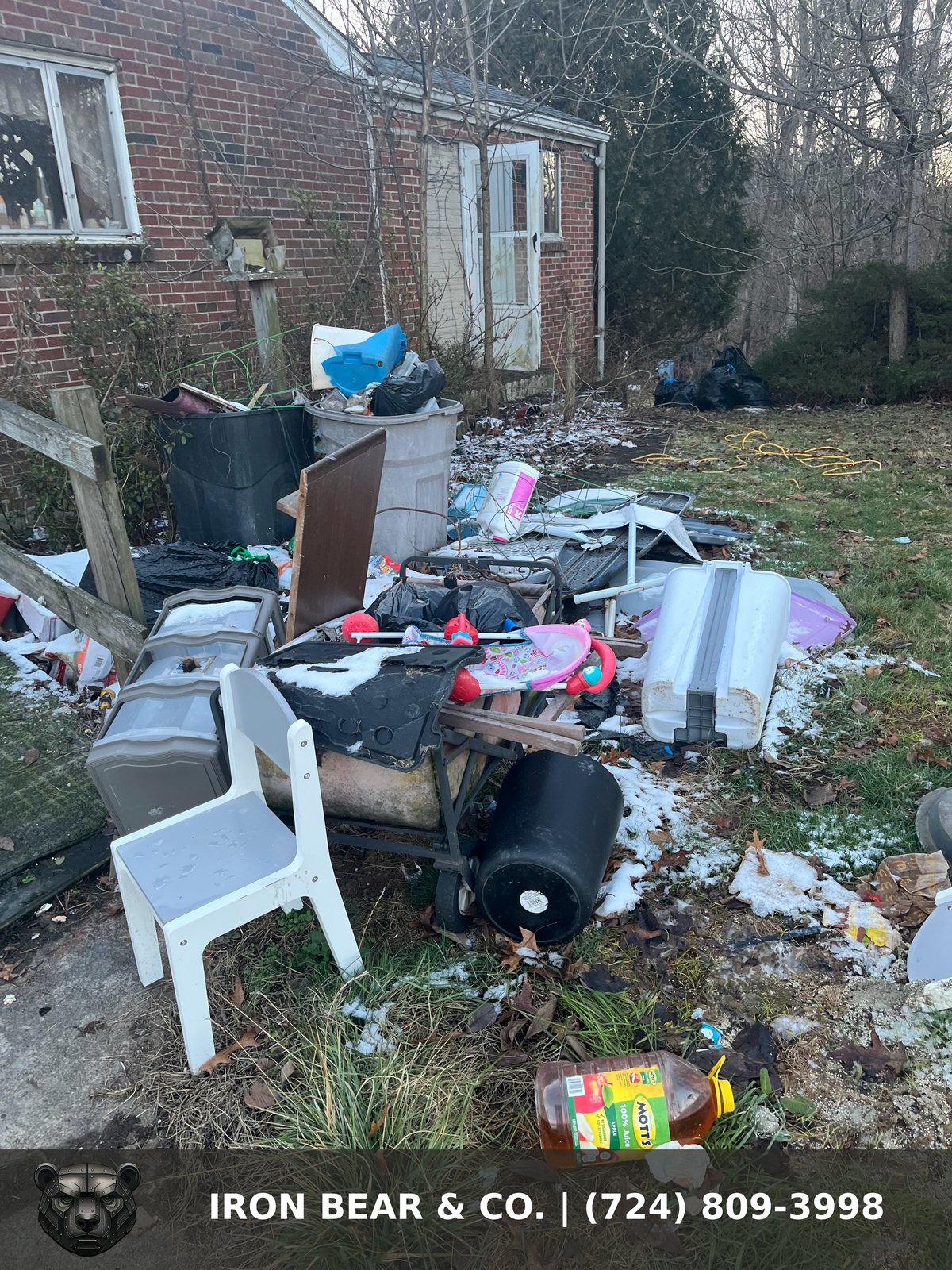 Household junk and furniture piled for removal before an Iron Bear & Co. cleanout near Bethel Park PA